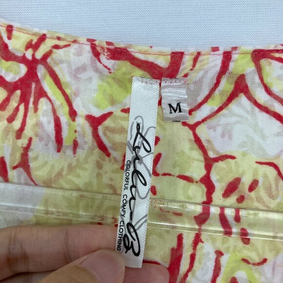 Lulu-B medium Colorful Floral Shark-Bite Hem Stretch Short Sleeve Knit Blouse - Picture 2 of 12